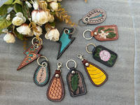 Porte-clés en cuir taillé sculpté à la main Porte-clés en cuir de forme exotique mignon Accessoires en cuir taillé Porte-clés mignons pour unisexe