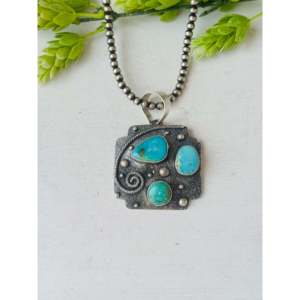 Pendentif Randy Billy Kingman serti de pierres avec incrustation de turquoise et d'argent sterling - Product Image 1