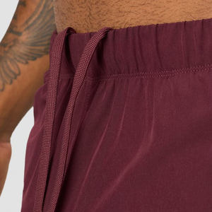 Short de sport d'été pour homme avec fonction de séchage rapide Pantalon de course d'entraînement en gros Poche intérieure solide Vêtements pour homme écologiques - Product Image 4