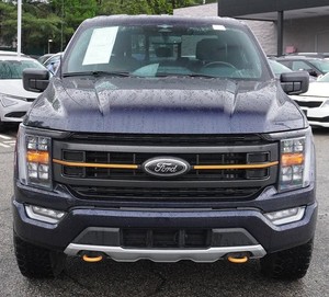 Premium usado 2023 Ford Tremor SuperCrew 4WD con asientos de cuero sistema de navegación arranque remoto techo solar Android Auto - Product Image 1