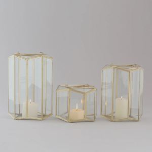 Candelabro de luz de té con linterna dorada de metal de diseño diferente para interior y exterior para decoración del hogar, Hotel, restaurante, regalos de boda - Product Image 1