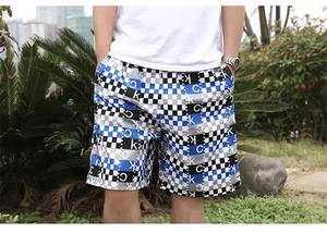 OEM Short de bain de plage pour hommes, décontracté, de haute qualité, personnalisé, écologique, avec motif solide, imprimé en toile, à séchage rapide. - Product Image 3