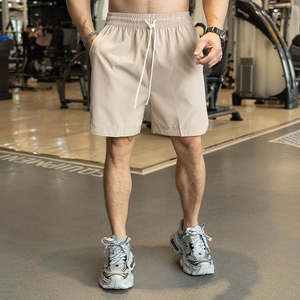 Light Men Gym Shorts Logotipo personalizado Blanco y verde fluorescente Pantalones cortos para correr - Product Image 4