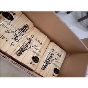 Top Stocked Disposable Bamboo Twin <b>Chopsticks</b> With Logo Paper Cover Bulk New Bulk Dinnerware Eco Friendly Custom Design - Product Image 1