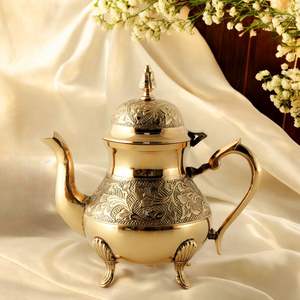 Handcrafted metal tea pot with embossed design suitable for home display or daily tea brewing use - Product Image 4