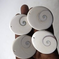 Pierre précieuse œil de Shiva faite à la main, pierre précieuse Gomti Chakra, coquille de mer naturelle et perceuse, pierres précieuses en vrac saines pour la bijouterie