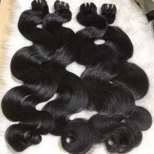 Extensions de cheveux vierges vietnamiens Tissage de cheveux humains bruts du Vietnam Cheveux vierges de qualité 100g ondulés - Product Image 5