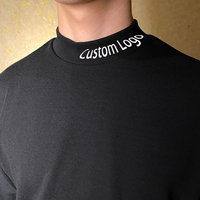 Camiseta de hombre negra de cuello alto, de algodón grueso tejido, corte holgado y largo, personalizada