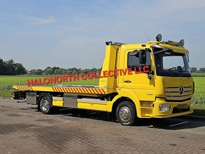 Camion de remorquage Mercedes-Benz Atego 2021 d'occasion, plateau plat, diesel Euro 5, jaune, transporteur de voitures lourdes d'occasion - Product Image 2