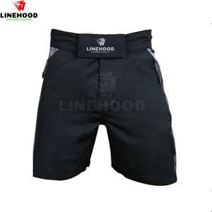 Pantalones cortos de tablero de artes marciales de calle alta personalizados para hombre, patrón sólido, lona, cintura media, cierre elástico, hechos en Pakistán - Product Image 1