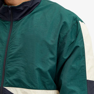 Chaqueta cortavientos para hombre con cremallera al por mayor de color de retazos de nuevo diseño de alta calidad, chaqueta deportiva arrugada de nailon al por mayor - Product Image 4
