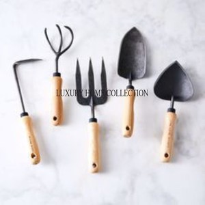 Durable long-lasting cast iron fire pit tools with a strong ergonomic handle <b>for</b> securely moving and adjusting <b>burning</b> wood - Product Image 2