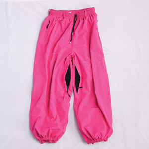 2025 OEM cálido 100% poliéster pantalones de nailon al aire libre holgado esquí nieve mujeres y Hombre Ropa de snowboard a prueba de viento impermeable pantalón de gran tamaño - Product Image 1