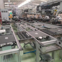 Sistema de Transporte de Cadenas para Palets de Alta Resistencia con Módulos Acumuladores Automáticos para Centros de Distribución Logística de Almacenes