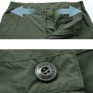 กางเกงคาร์โก้ผู้ชายสไตล์ลำลองแบบยุทธวิธี ออกแบบเองได้ หลายกระเป๋า สตรีทแวร์ สำหรับกิจกรรมกลางแจ้ง กางเกงคาร์โก้ผู้ชายแบบฟอก - Product Image 2