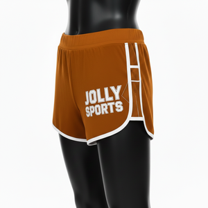 Shorts de poliéster y spandex premium para mujer, color naranja con ribetes blancos, paneles laterales de malla, logotipo personalizado con serigrafía. Shorts para mujer. - Product Image 4