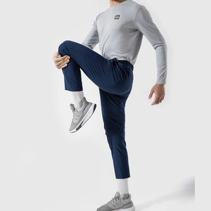 กางเกงผ้าแคนวาสขาวกลางเอวแบบลำลองของผู้ชาย OEM กางเกงทรงดินสอผ้ายืดน้ำหนักเบาสไตล์สปอร์ตพร้อมเชือกรูด - Product Image 4