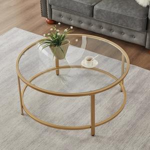 Table basse élégante et écologique pour la maison moderne, accent or et argent, design de tronc d'arbre antique, fer poli, plateau en verre, salon - Product Image 1