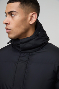 Veste matelassée à capuche mi-longue pour hommes avec logo personnalisé OEM en noir, coupe-vent et chaud, vestes à bulles en duvet matelassé de haute qualité pour hommes - Product Image 6