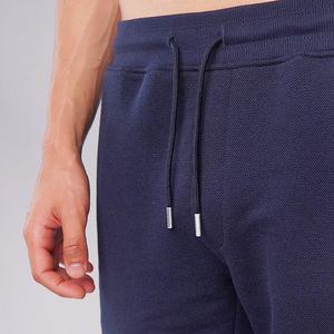 กางเกงขาสั้นผ้าฝ้ายผู้ชายเอวยางยืดยาวถึงเข่าปานกลางลายไม้ปากีสถาน - Product Image 2