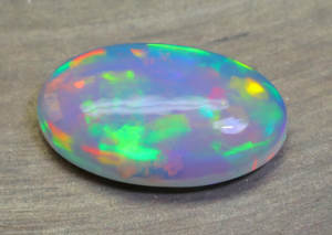 Precioso cabujón de ópalo etíope natural, sombra azul, arcoíris, forma ovalada llamativa, piedra preciosa de grado A.A.A - Product Image 5