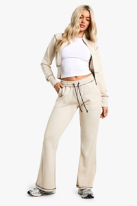 Nouveau design personnalisé imprimé feuille de lotus sans manches col en V Blouse Top couleur unie pantalon slim ensemble ceinture en polyester - Product Image 4