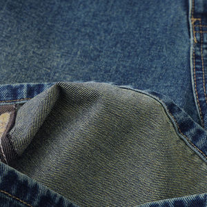 กางเกงขาสั้นผ้ายีนส์ของผู้ชายแบบสั่งทำแนวสตรีทแวร์แบบตัดและเย็บลวดลายทึบสไตล์ลำลอง - Product Image 4