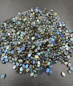 Haute qualité bleu Flashy Labradorite pierres précieuses en vrac lisse forme ovale Cabochon naturel 6x8mm-10x14mm pour la fabrication de bijoux - Product Image 2