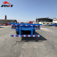 JIYAKE 2/3/4 essieux conteneur à plat Camion de transport lit plat Semi remorque 20 pieds 45 pieds 40 pieds conteneur à plat Semi remorque
