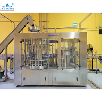 Ligne de production d'eau potable en bouteille entièrement automatique / Machine de remplissage et d'embouteillage d'eau minérale