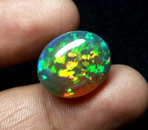 อัญมณีโอปอลเอธิโอเปียที่น่าสนใจรูปไข่อัญมณีโอปอลสีรุ้งแวววาวอัญมณีโอปอลเอธิโอเปียหลวมของขวัญสำหรับเธอ - Product Image 1