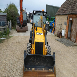 รถตักล้อยาง CB Skid Steer Loader 1CX เครื่องยนต์ดีเซลยันมาร์ รถแทรกเตอร์/รถแบคโฮประสิทธิภาพสูง ชุดเกียร์ปั๊มหน้ารถตัก Huade Bearings - Product Image 1