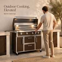 Barbecue à gaz extérieur marron sur chariot en acier inoxydable avec brûleur latéral et tiroirs de rangement