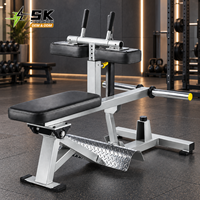 Machine à soulever les mollets assis SK à charge libre pour la formation des jambes, idéale pour les achats en salles de sport commerciales et les projets de centres de fitness