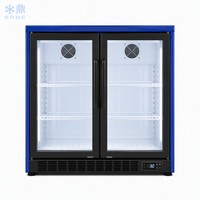Réfrigérateur minibar à double zone de température pour hôtel, avec porte en verre trempé, adapté au réfrigération des boissons.