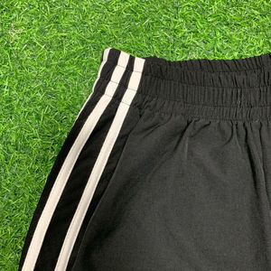 เสื้อแจ็คเก็ตวินด์เบรกเกอร์ลายทางไนลอนแบบยูนิเซ็กซ์ทันสมัย ทรงปกติ ซิป กระชับรูปร่าง กางเกงไนลอนทรงเข้ารูป แห้งเร็ว ปลายขาหลวม - Product Image 4