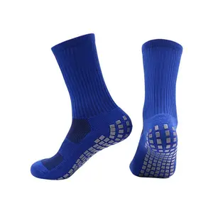Calcetines deportivos largos por encima de la rodilla con agarre de tobillo de color azul sólido al por mayor con acolchado