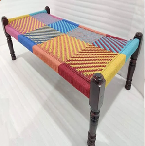 Atractiva charpai con un patrón tejido de estilo patchwork en colores vibrantes como rosa, azul y amarillo, a precio de mayoreo. - Product Image 1