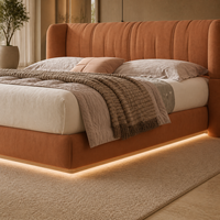 Solution de mobilier de chambre à coucher en bois flottant avec LED personnalisées, lit moelleux orange, armoire, matelas, table de chevet, coiffeuse, panneau mural, pour hôtel