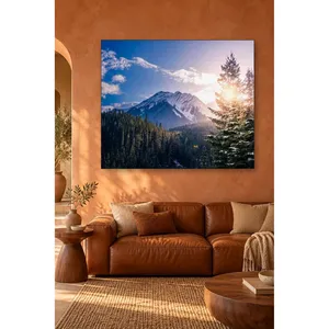 Impression sur toile Fida Sunlight dans une forêt de pin et sur un sommet enneigé - Product Image 2