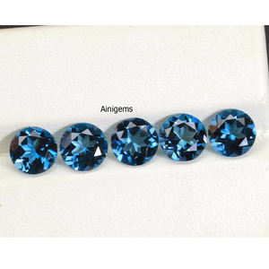 Véritable Topaze Bleue de Londres Pierre précieuse de 6mm à 12mm Topaze Ronde Topaze Bleue Profonde Pierre taillée à Facettes du Brésil - Product Image 1