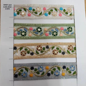 Encaje bordado floral negro elegante con detalles intrincados, perfecto para crear vestidos de novia sofisticados, ropa de noche - Product Image 1