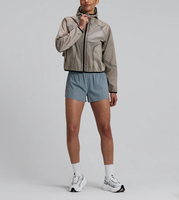 Nouvelle arrivée, veste de sport pour femmes, automne, imprimé uni, ultra-légère, coupe-vent, veste de course courte, tissu en nylon fin tissé, logo sur le devant