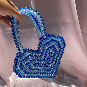 Trendy multi-blue crystal beaded <b>heart</b>-shaped mini <b>bag</b> with a vibrant zigzag pattern and comfortable handle, at wholesale prices - Product Image 1