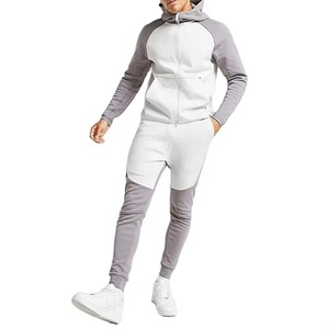 Venta al por mayor de fabricación de chándal de diseño personalizado para hombre con cremallera Sudadera con capucha y pantalones de chándal conjunto de bloque de color traje de chándal de algodón - Product Image 1