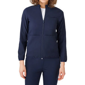 Uniformes de poliéster de algodón antiarrugas transpirables con bolsillos de Pakistán para enfermeras con cuello en V sólido de alta calidad - Product Image 5