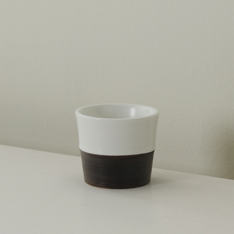 Tazza singola in bianco e nero