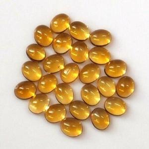 Cabochon en citrine naturelle 7x9mm de forme ovale en pierre précieuse jaune lisse pour la fabrication de bijoux Origine indienne Kiran & Sons Gems Co - Product Image 1