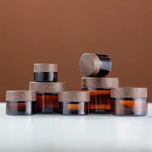 Tarros <span class=keywords><strong>de</strong></span> crema facial <span class=keywords><strong>de</strong></span> vidrio negro mate al por mayor <span class=keywords><strong>de</strong></span> 5/10/20/30/50 g con tapa <span class=keywords><strong>de</strong></span> imitación madera <span class=keywords><strong>para</strong></span> pestañas postizas - Product Image 1