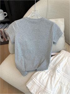 เสื้อยืดคอกลมแขนสั้นผู้ชาย ผ้าฝ้าย 100% คุณภาพสูงใหม่ พร้อมคุณสมบัติป้องกันขนร่วง ทรงหลวม ลายตัวอักษร น้ำหนัก 220 กรัม - Product Image 6
